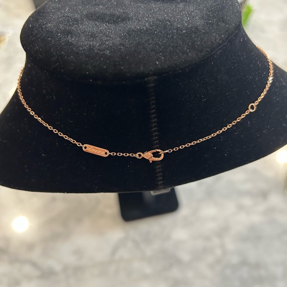 - Pink holiday motif and rose gold hardware - Picture 2 of 2